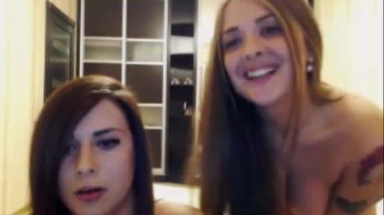 Two Hot Russian Camgirls Kiss And Swap Spit