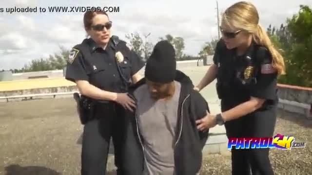 Brunette cop pleasing black dude