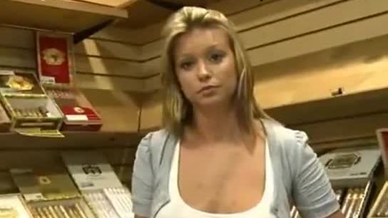 Blonde Girl Flashes On Cigar Store